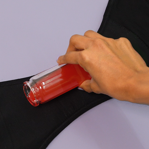 Nushu period underwear in an absorption test, efficiently soaking up liquid while maintaining a dry and leak-proof surface.